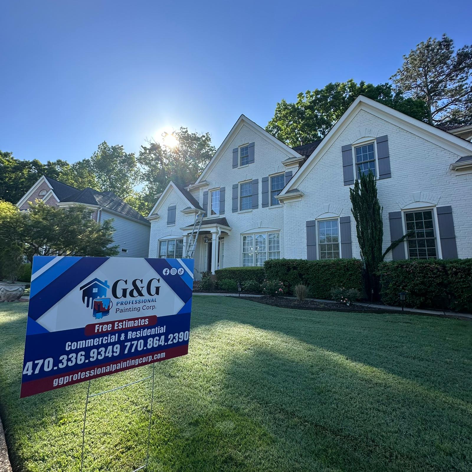 G&G Professional Painting yard sign outside a finished Atlanta-area home