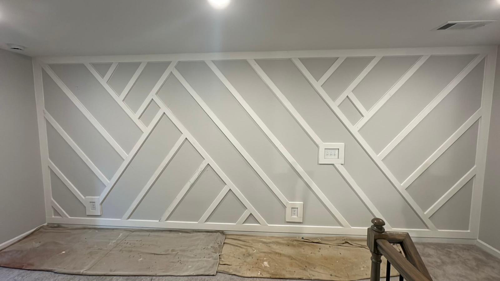 Smooth, primed, and painted feature wall finished by G&G Professional Painting