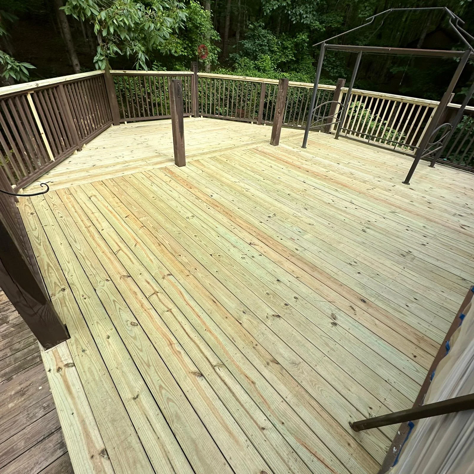 Wood deck and railings prepared for staining and sealing